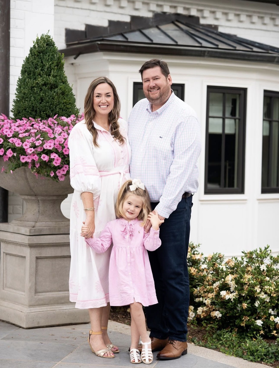 Bryan, Emily, and Clara at home in Greenville